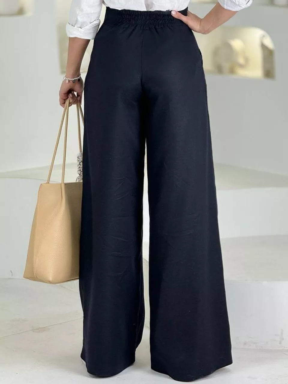 شلوار پارچه ای بگ 31152 کمر کج تنسل RY